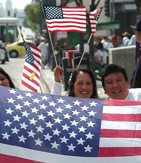 May Day, Wilshire Boulevard, Los Angeles, showing the flag on 'A Day Without Immigrants' to demonstrate the importance of immigrants to the US economy
