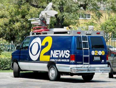 It seems the CBS guys just locked up their van and went to the pastis booth -
