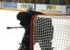 The goalie, being reminded of Hawaii and of garbage collection -