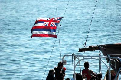 The folks headed out flying a foreign flag - 