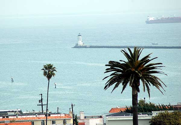 The working lighthouse at the breakwater, the entrance to the Port of Los Angeles and to the main shipping channels -