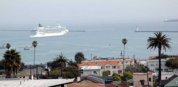 The working lighthouse at the breakwater, the entrance to the Port of Los Angeles and to the main shipping channels -