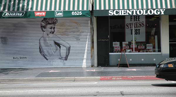 Betty Grable on Hollywood Boulevard security door, with the Scientology office next door