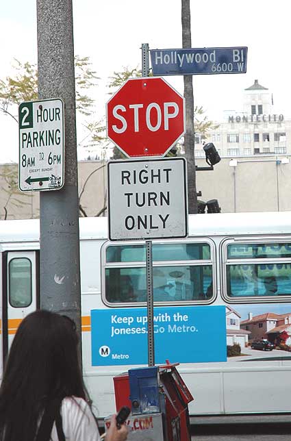 Signs and symbols at the corner of Hollywood Boulevard and Cherokee