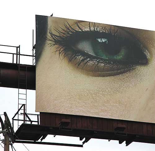 Billboard with big eyes, Sunset at Crescent Heights, Los Angeles (Sunset Strip)