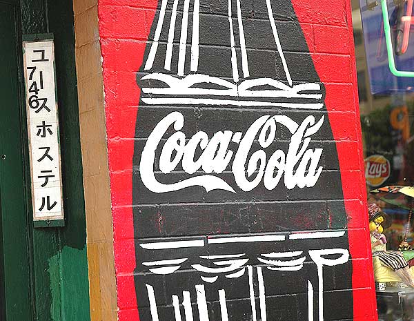 Painted Coke sign at hostel for foreign students, Hollywood Boulevard, across the street from Grauman's Chinese Theatre