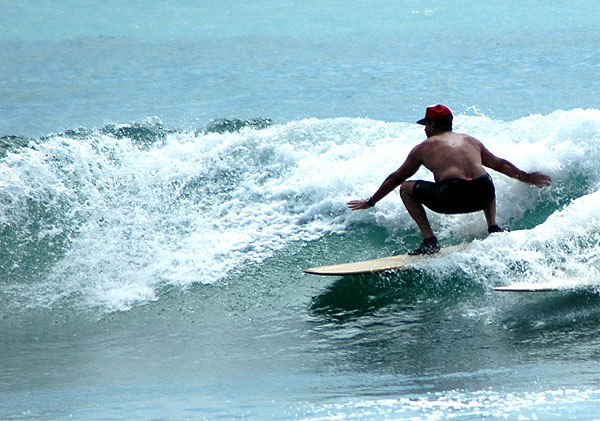 Older Surfer with baseball cap, Surfrider Beach on the north side of Malibu Pier