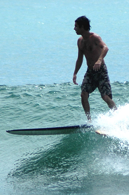 Surfer, Surfrider Beach on the north side of Malibu Pier