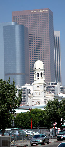 Mixed mode - new Thunderbird and an SUV, an old church, and the skyline of downtown Los Angeles  - the late morning view from Los Angeles' Little Tokyo, 25 August