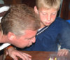 Father and son, and cake...