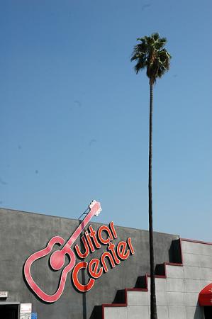 In the center of it all, the flagship Guitar Center store and museum - with the appropriate palm tree