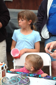 Tiffany and Emily look on -